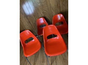 Stackable Orange Chairs