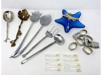 Assorted Hosting Accessory Collection With Sign Holders, Napkin Rings, And Unique Serving Forks And Spoons