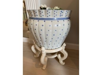 White With Blue Polka Dots Planter On White Wood Stand