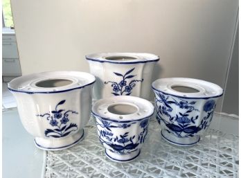 Four Blue And White Ceramic Flower And Bud Vases