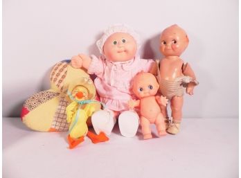 Assortment Of Dolls Including Signed 1985 Cabbage Patch & Kewpie Doll Composite With Painted Face And More