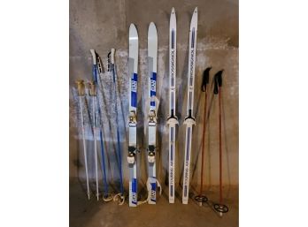 Two Pair Older Model Snow Skis & Poles- Elan & Rossignol