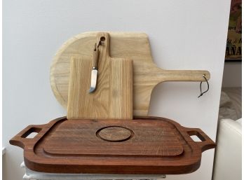 Group Of Various Wooden Cutting Boards Including Teak.