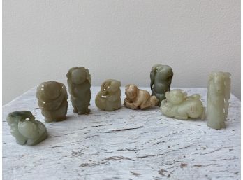 Group Of 8 Sculptural Figures (possibly Jade)