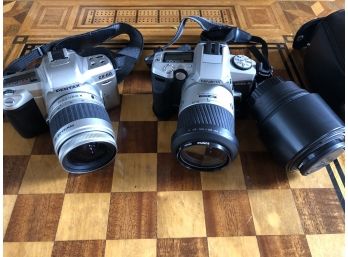 A Pair Of 35mm SLR Cameras - Pentax, Minolta And A 70mm Lens