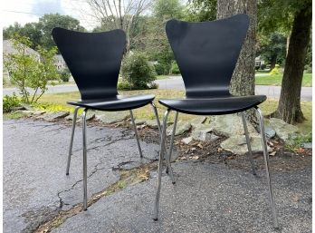 A Pair Of MCM-Style Chairs