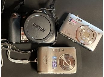 Three Nikon Digital Cameras