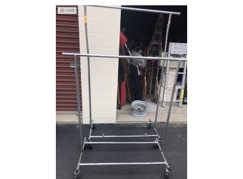 Two (2) Adjustable Clothing Racks