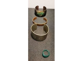 3 Cuff Bracelets And A Green Ring, Size Unknown