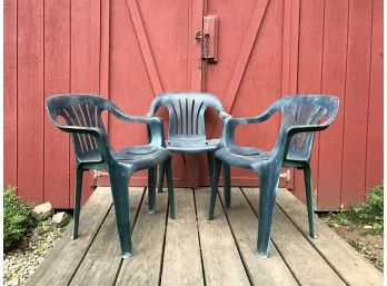 Three Green Plastic Patio Chairs