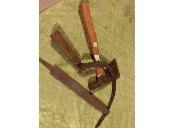 A Hatchet, Filer, And Hand Sickle