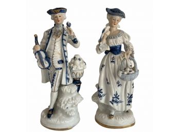 A Pair Of Porcelain Figurines Of 18th Century Couple