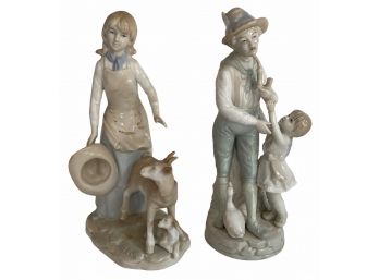 Pair Of Porcelain Figurines - Man With Child, Woman With Doe