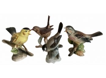 Four China Bird Figurines