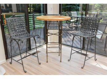 Round Pub Height Table With Three Metal Weave Bar Stools