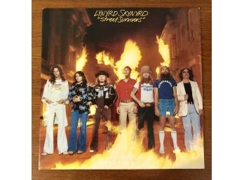 LYNYRD SKYNYRD - STREET SURVIVORS. 1977 Vinyl LP On MCA Records (MCA-3029). Vinyl And Jacket Very Good Plus