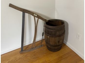 ANTIQUE OAK BARREL AND SAW