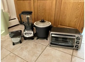 NINJA BLENDER/FOOD PROCESSOR, A CROCK POT, A TOASTER, ETC.