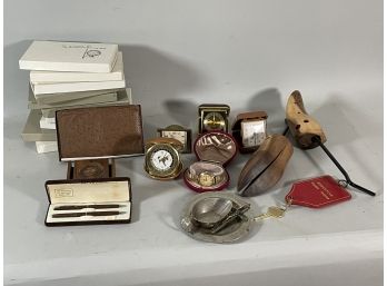 LOT OF WALLETS IN ORIGINAL BOXES, ALARM CLOCKS, GOLD FILLED WATCH, ETC.