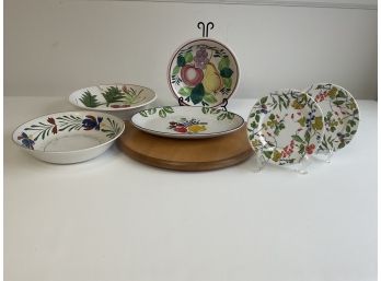 Ceramic Dishes And Wooden Trivet