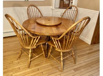 Round Wrought Iron And Wood Table With Four Windsor Arm Chairs And Lazy Susan