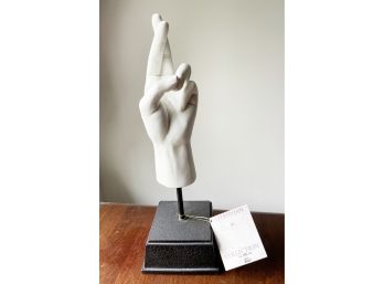 Finger's Crossed Statue