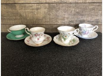 4 Tea Cups And Saucers