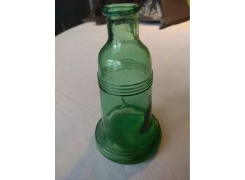 One Green Glass Bottle Shaped As The Liberty Bell