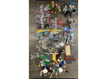 Lot Of Legos With Three Larger Lego Transfomers Type Soldiers