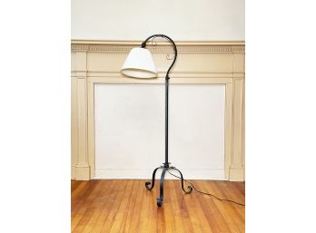 A Wrought Iron Standing Lamp