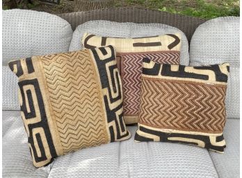 A Group Of 3 Hand Sewn African Kuha Cloth Pillows