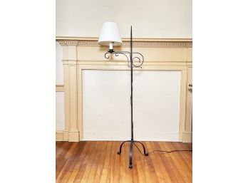 A Wrought Iron Standing Lamp