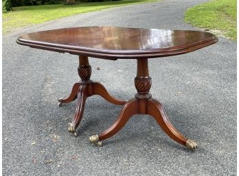 A Mahogany Extendable Dining Table With Pedestal Base In Duncan Phyfe Style