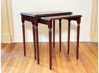 A Pair Of Vintage Mahogany Nesting Tables