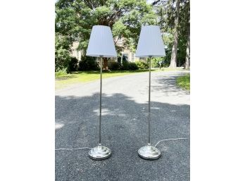 A Pair Of Chrome Floor Lamps