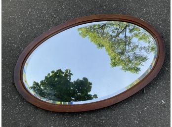 An Edwardian Mahogany Beveled Mirror