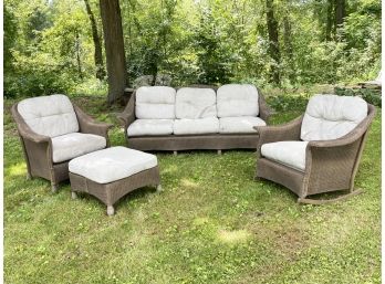 An Outdoor Resin/Wicker Style Seating Set