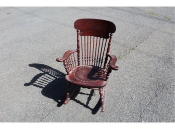 Reddish Wooden Rocking Chair