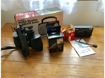 Electronic Lot  Binoculars, Sure Shot Camera, Eliminator Battery Charger, Weather Radio