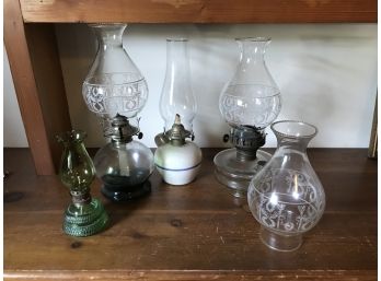 Four Hurricane Oil Lamps With Extra Chimney