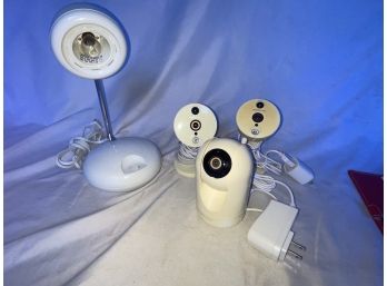 Three Foscam Wifi Home Wireless Security Cameras And A Desklamp