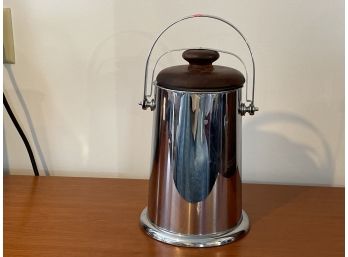 A MIDCENTURY MODERN CHROME ICE BUCKET WITH TEAK LID