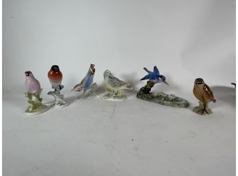 A COLLECTION OF SIX PORCELAIN BIRD FIGURES