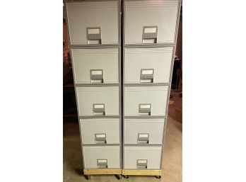 Pair Of Plastic File Cabinets On Wood With Casters