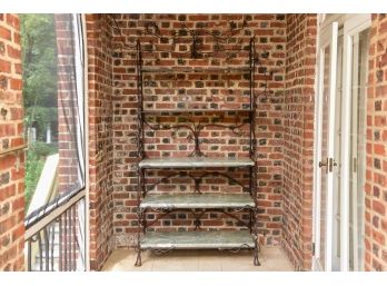 Wrought Iron And Marble Bakers Rack With A Grape Vine Detailing