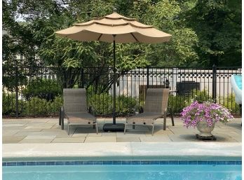 Pair Of Coated Aluminum Mesh Fabric Adjustable Chaise Lounge Chairs And Oversized Tilting Umbrella