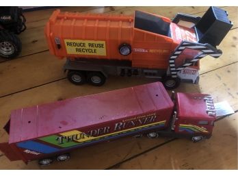 Two Toy Trucks