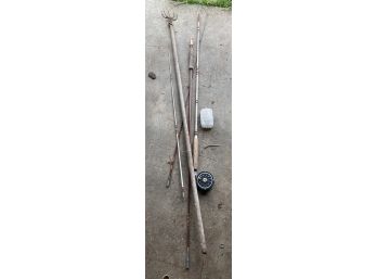 Vintage Fishing Poles And Spear