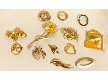 Grouping Of Gold Tone Brooches