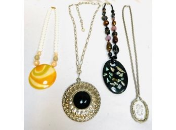 Four Oversized Pendant Necklaces